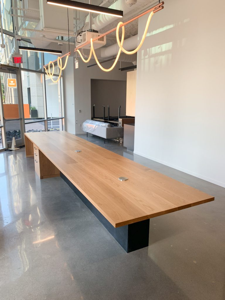 Long oak desk in the Gensler Phoenix office. 